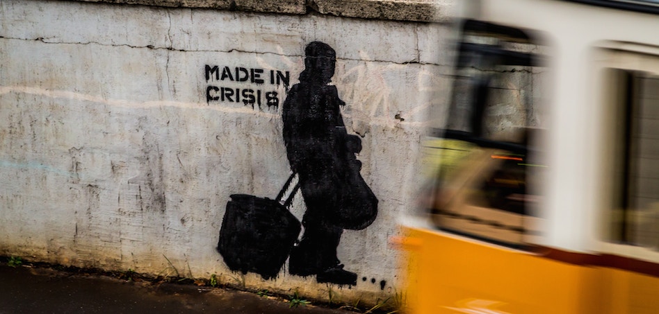 Grafiti de un niño en Hungría. La economía bajo la amenaza de la recesión